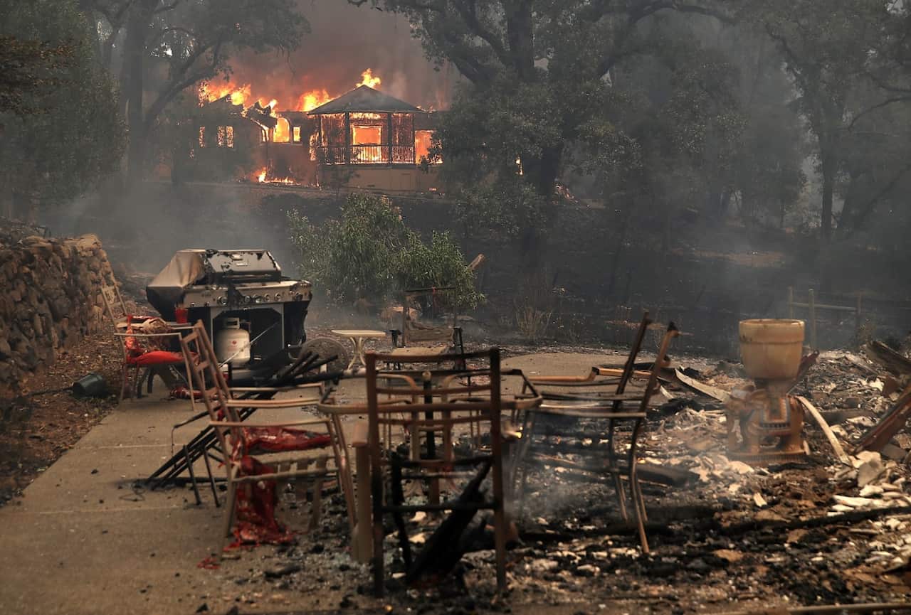 Fire consumes a home as an out of control wildfire move through the area on October 9, 2017 in Glen Ellen, California.