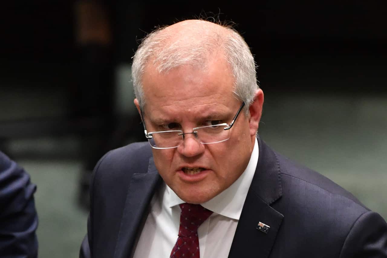 Prime Minister Scott Morrison leaves after Question Time in the House of Representatives.