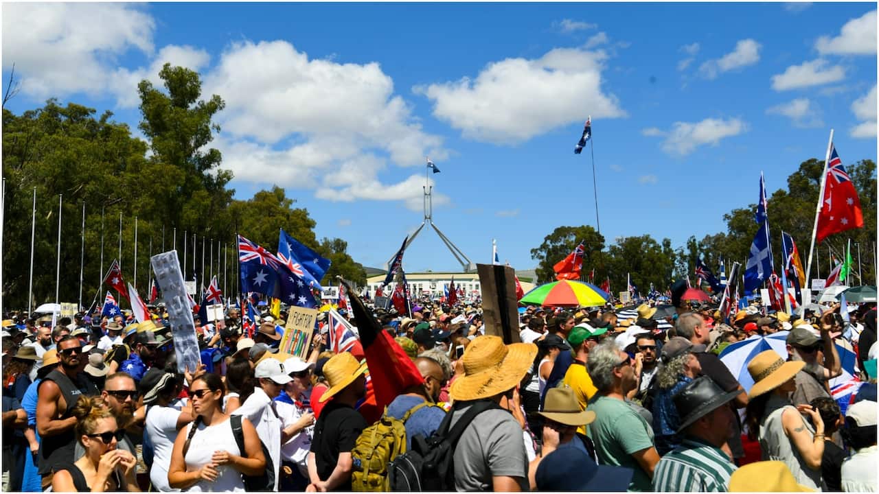 Thousands of people take part in a ‘Convoy to Canberra’ protest outside Parliament House in Canberra, Saturday, February 12, 2022.