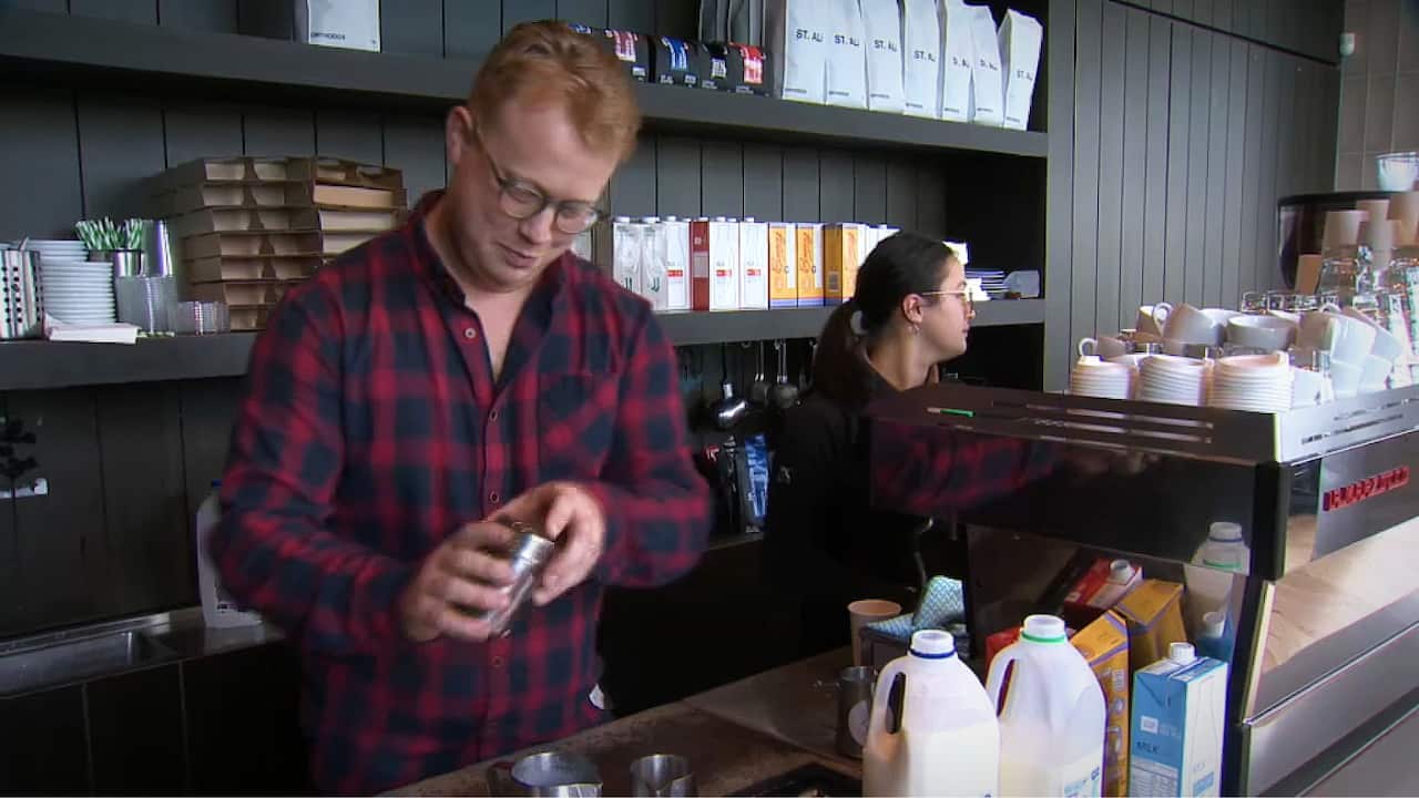 Daniel Dick working in his Melbourne cafe 