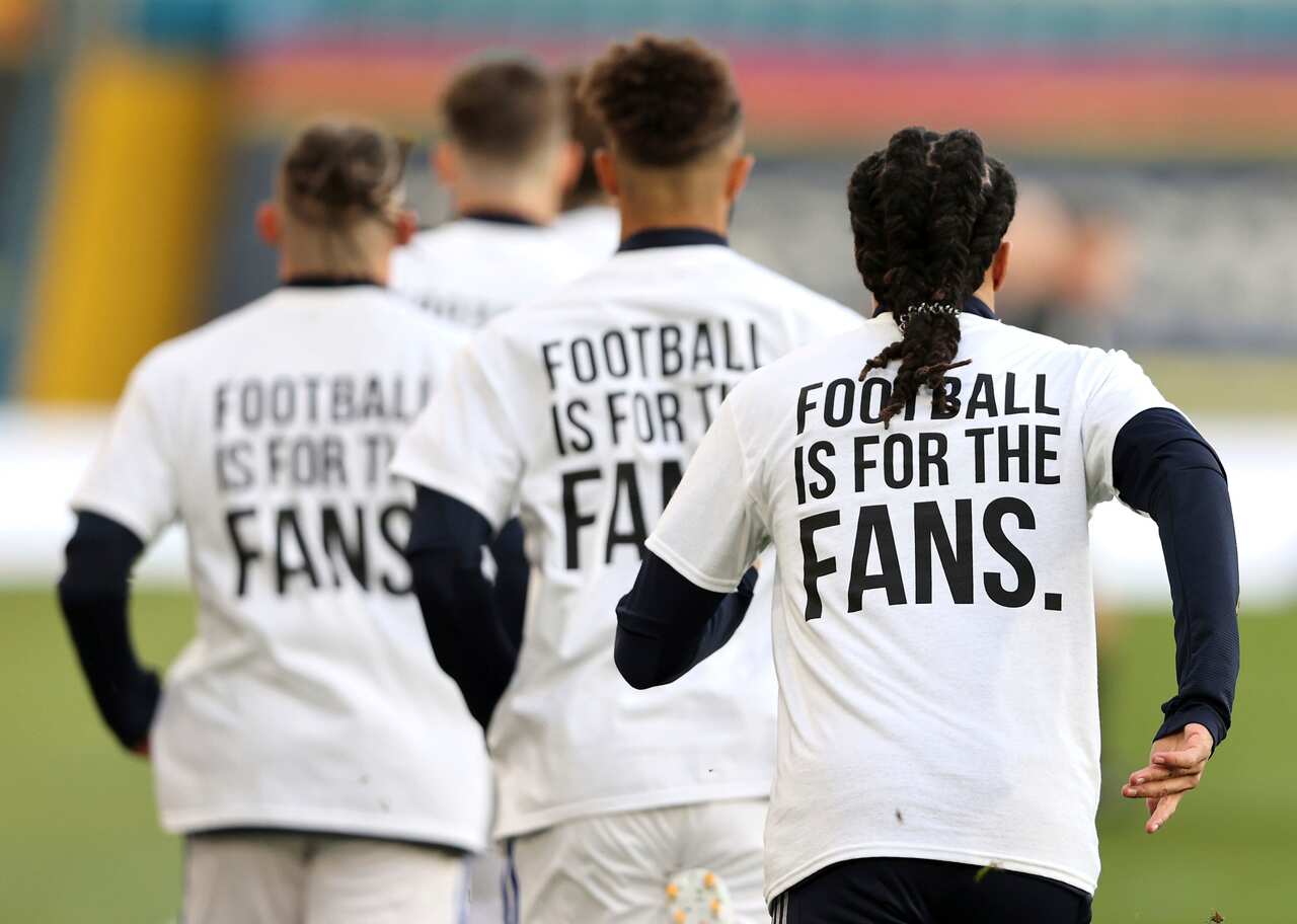Leeds United players wore protest t-shirts saying 'football is for the fans' ahead of theit English Premier League match against Liverpool on Tuesday