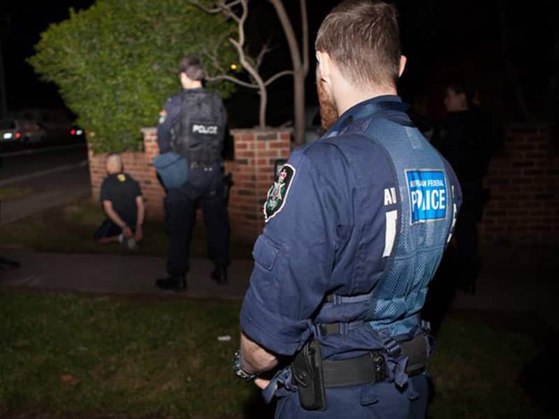 A man arrested following the execution of search warrants in Sydney