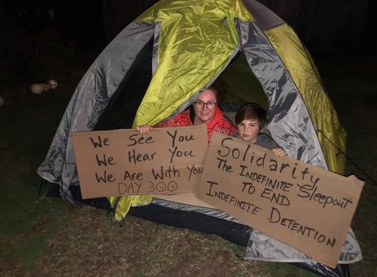 Participants in the sleepout mark 300 days. 