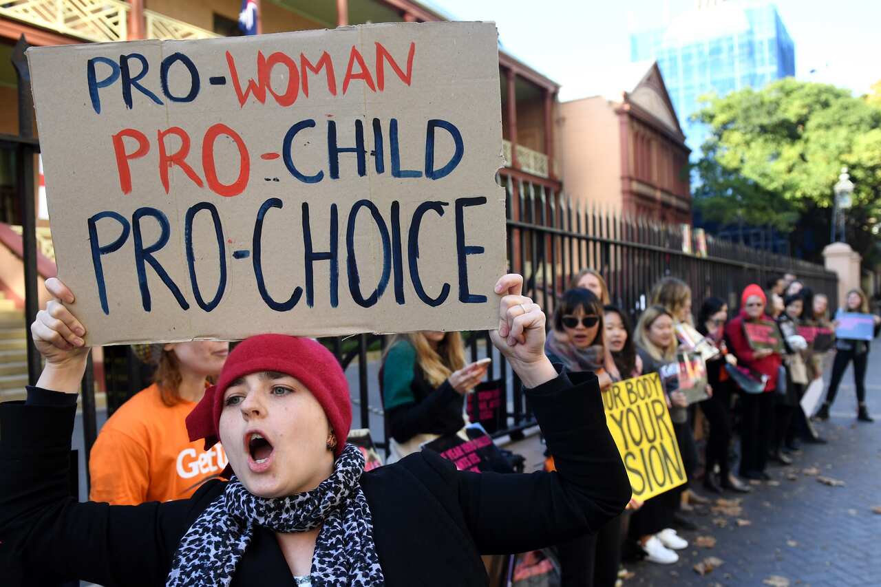 Protesters gather outside of the NSW State Parliament building urging MPs to support NSW bill to decriminalise abortion in Sydney on Thursday, May 11, 2017.