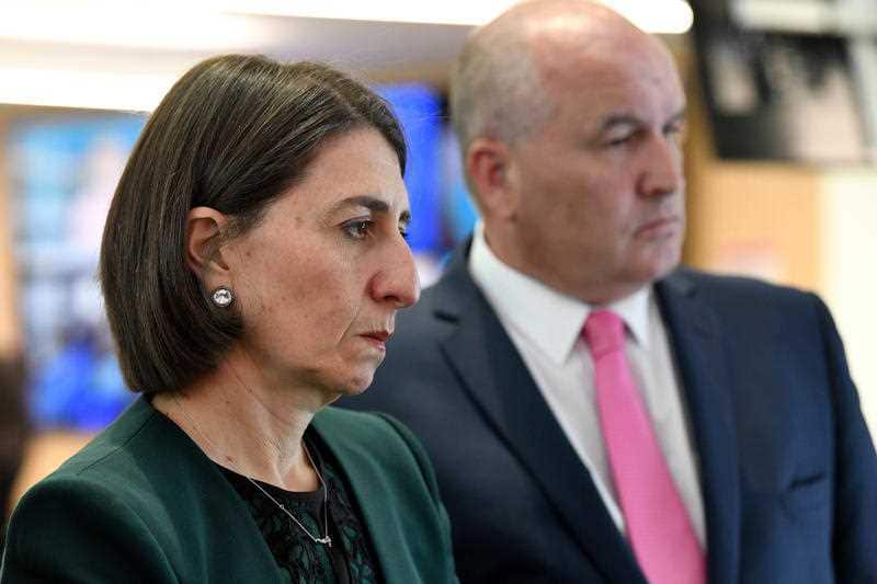 NSW Premier Gladys Berejiklian (left) and NSW Minister for Police and Emergency Services David Elliott 