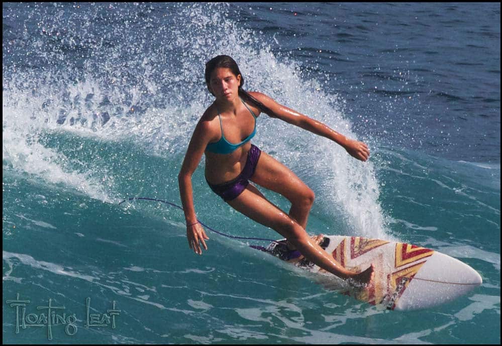 A tourist moves through the Bali Surf.