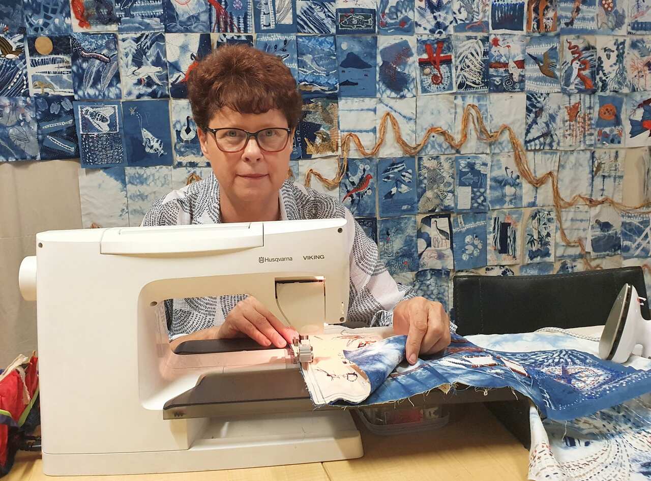 Barbara Williams hard at work preparing the completed "blocks".