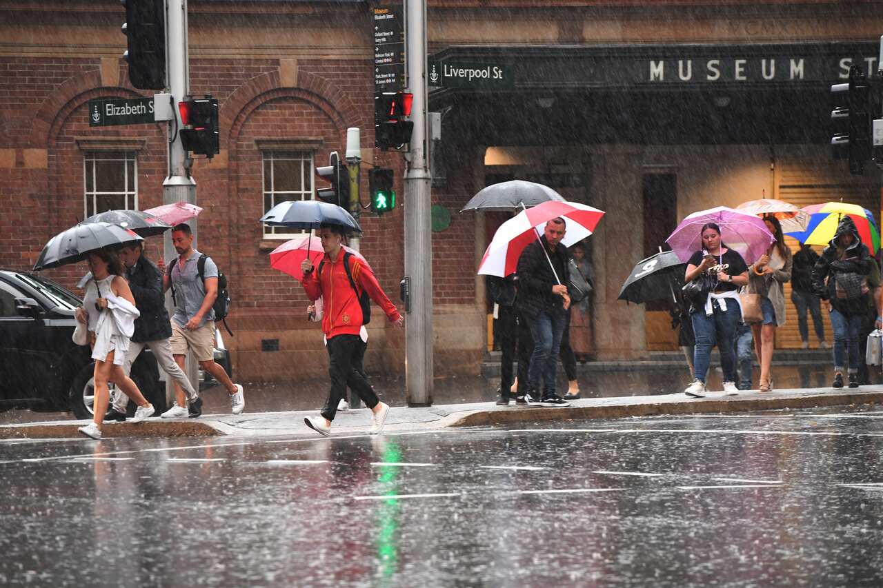Soggy streets greated commuters as they travelled through inner-Sydney.