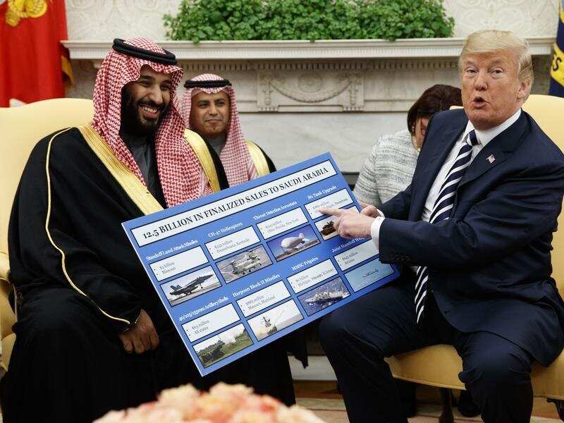 A file image of President Trump g with Saudi Crown Prince Mohammed