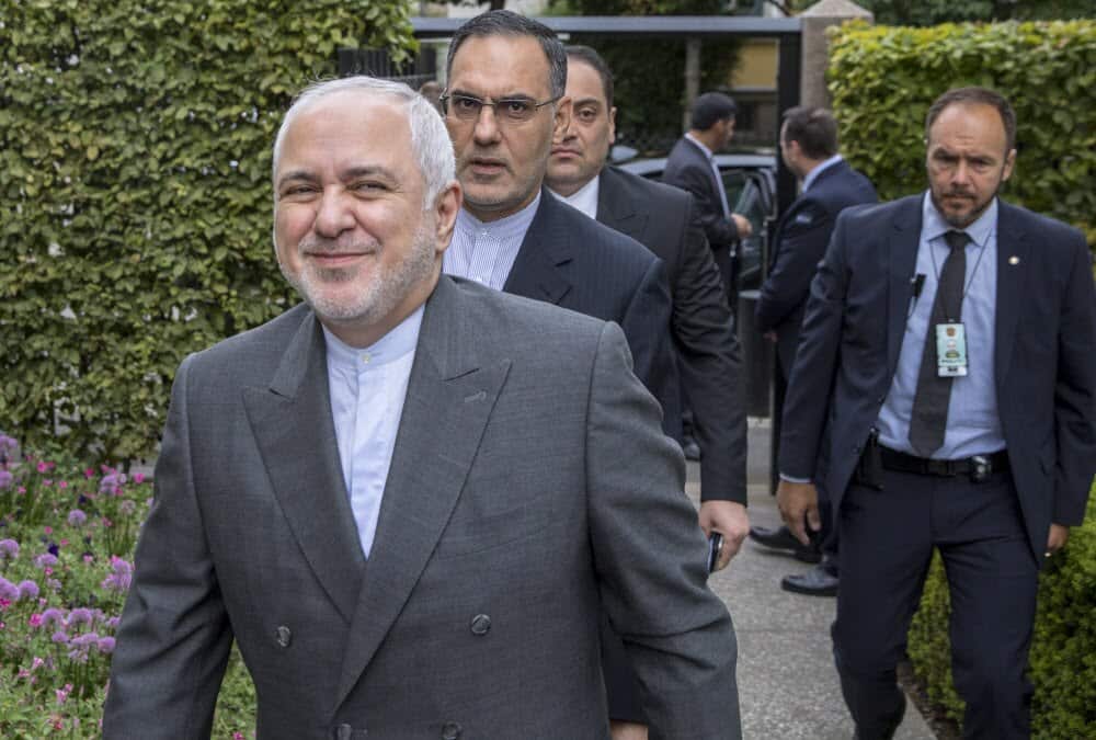 Iran's Foreign Minister Mohammad Javad Zarif (L) has made a suprise visit to the G7 summit in France.