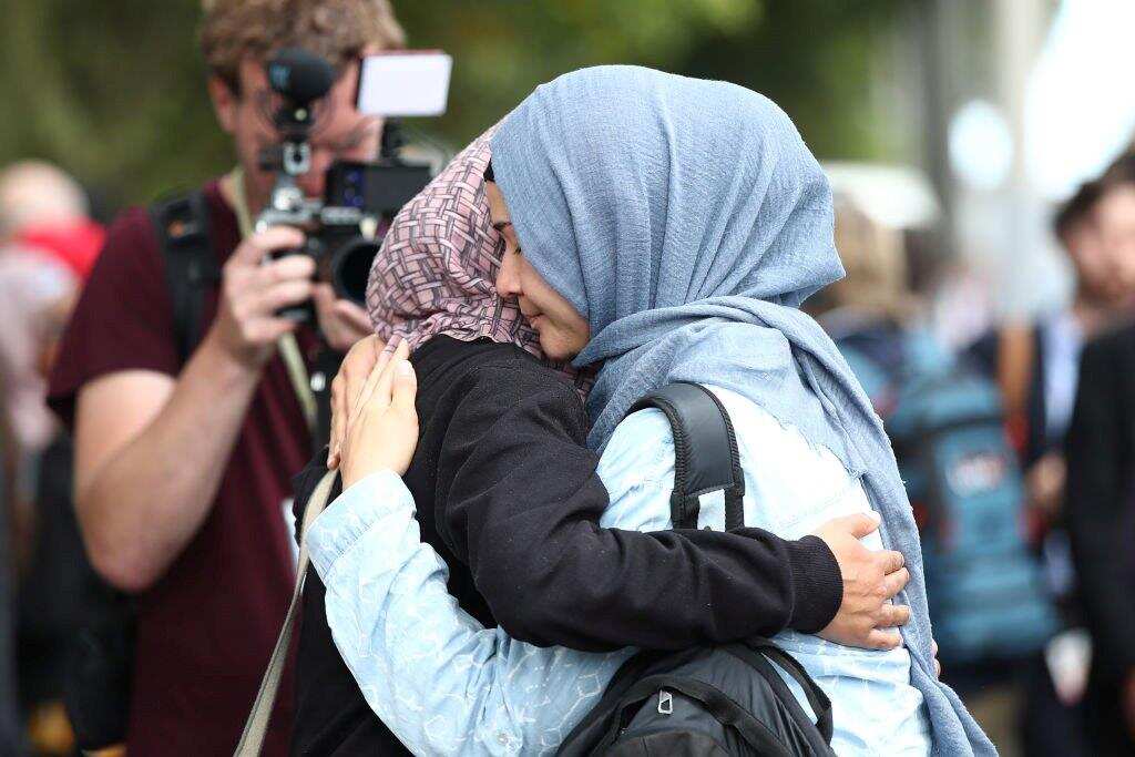 Two New Zealand women embrace in the wake of the Christchurch terror attack in March.
