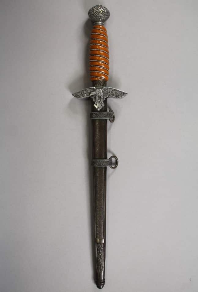 A "German Third Reich era Luftwaffe officer's dagger with scabbard".