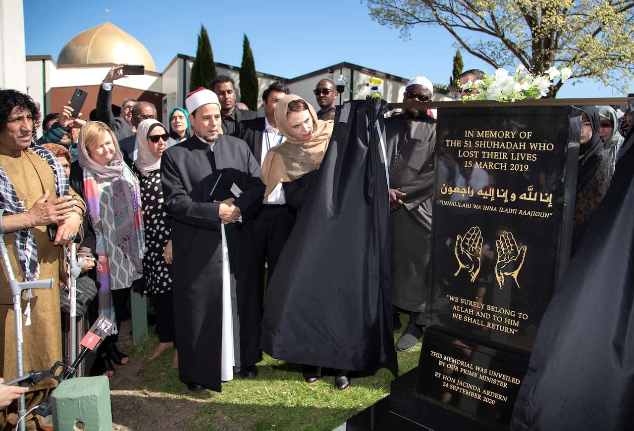 New Zealand Prime Minister Jacinda Ardern unveils a plaque at the Al Noor mosque in Christchurch on 24 September 2020.