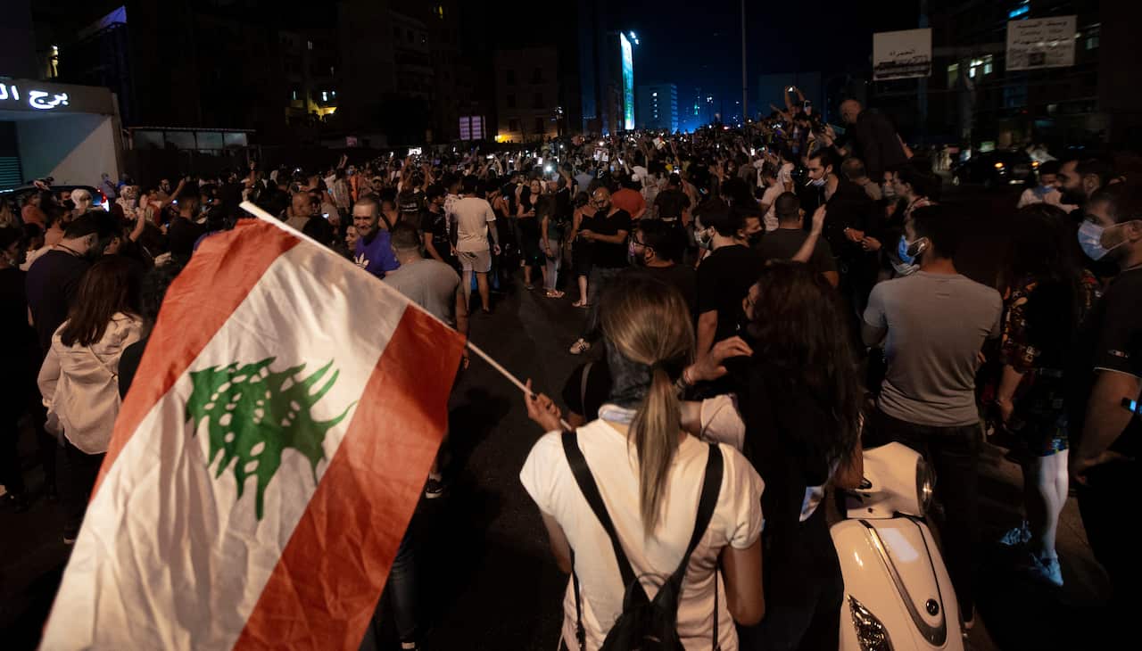 Protesters gather and close roads in Beirut and the suburbs during anti-government rallies.