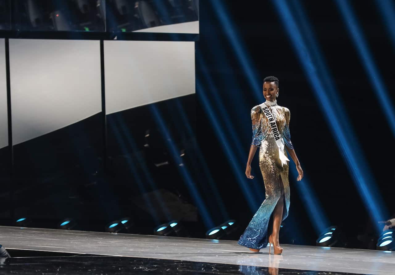 Miss South Africa Zozibini Tunzi walks on stage.