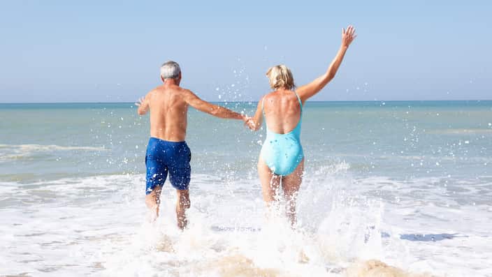 Senior couple on beach holiday