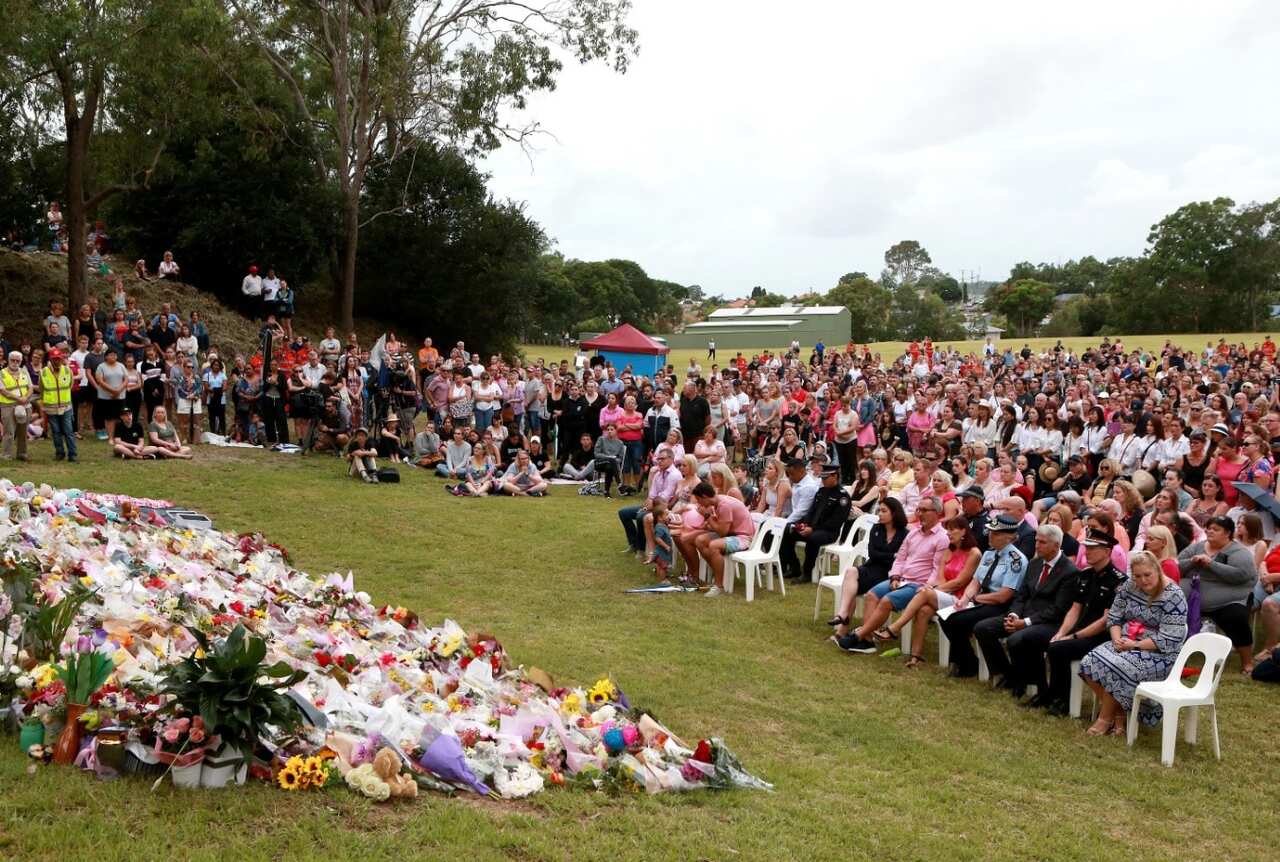 Hundreds turn out for a vigil for Hannah Clarke and her three children.