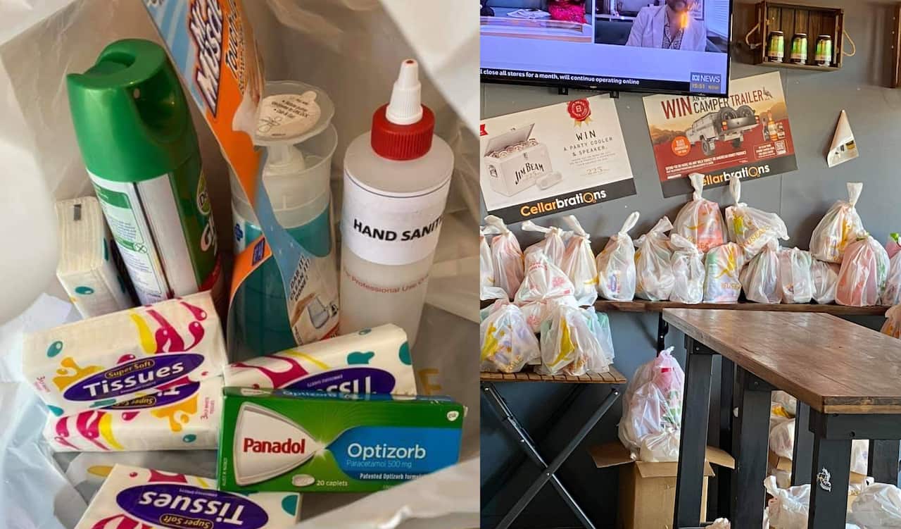 Một túi quà bao gồm nước rửa tay khô, khăn giấy, giấy vệ sinh, thuốc panadol, nước tẩy rửa nhà tắm, nước giặt, xà bông rửa tay.