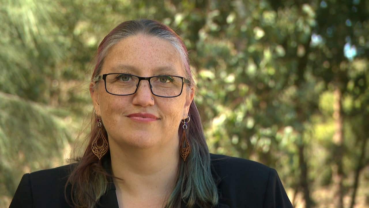 Bek Cramp has been an Auslan interpreter for two decades.