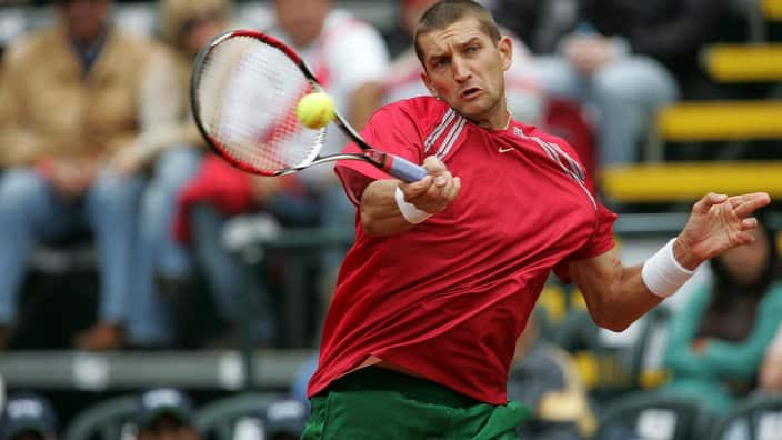 Belarus' Max Mirny returns the ball to Peru's Ivan Miranda during their Davis Cup tennis match in Lima, 21 September 2007