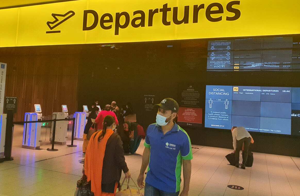 Bhim Neupane at Melbourne's international airport assisting with repatriation of stranded visitors from Nepal