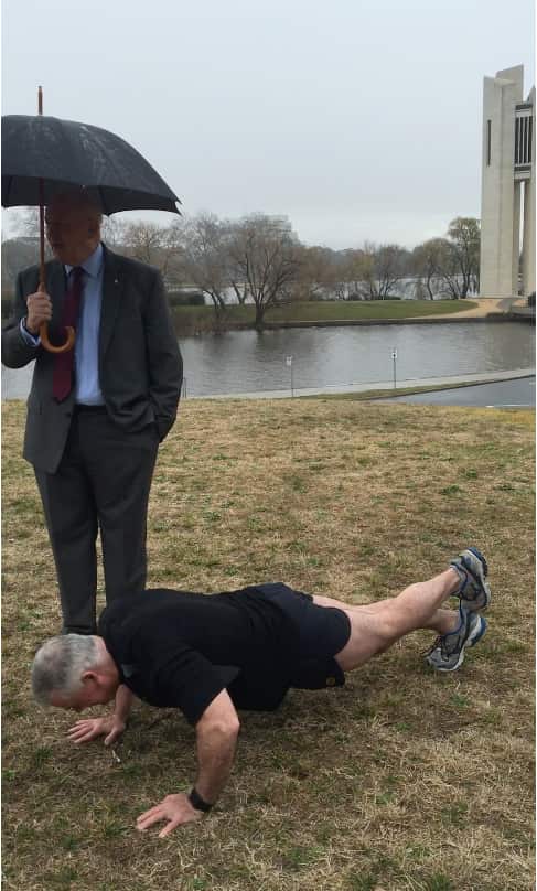 Governor General Sir Peter Cosrove keeping count of Bill's push ups
