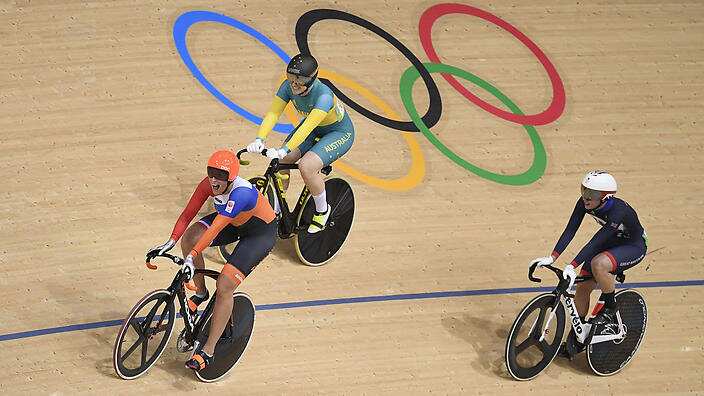 The Netherlands' Elis Ligtlee reacts after coming in first ahead of Britain's Rebecca James and Australia's Anna Meares