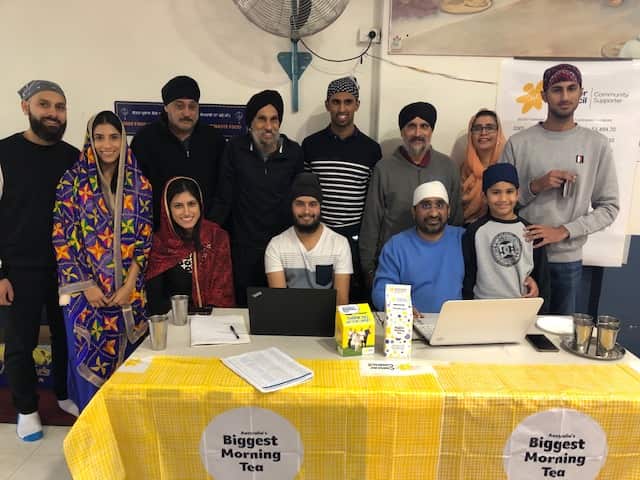 Amarjit Sidhu (back row, second from right), with her family and friends who help with the fund raiser
