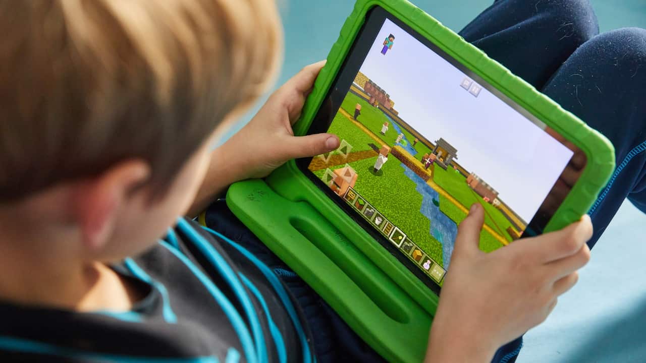 Boy playing Minecraft