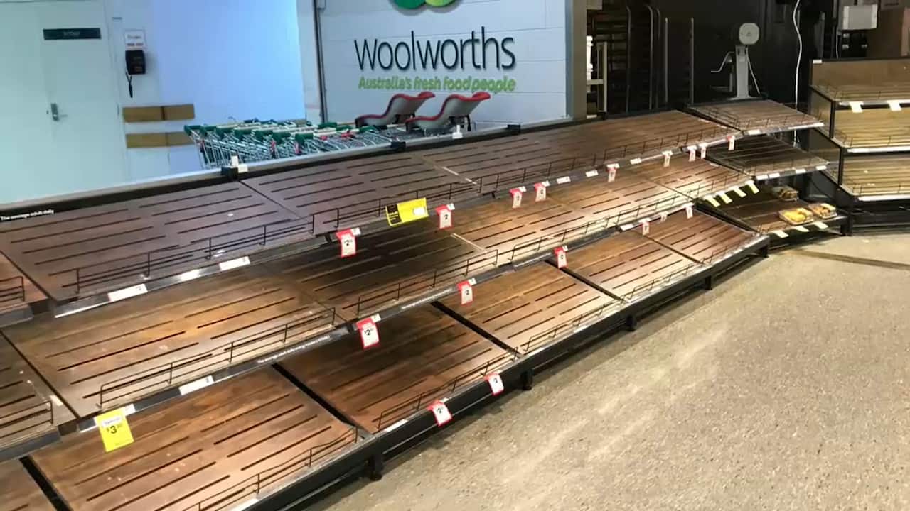 Supermarket shelves in Brisbane empty as residents stock up, some engaging in panic buying 
