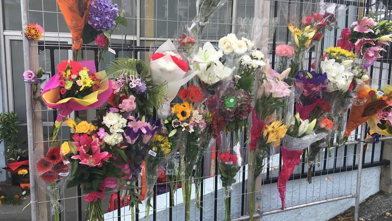 Flowers on the fence of Al-Ameen Mosque in Wellington to remember the victims of Christchurch attack.