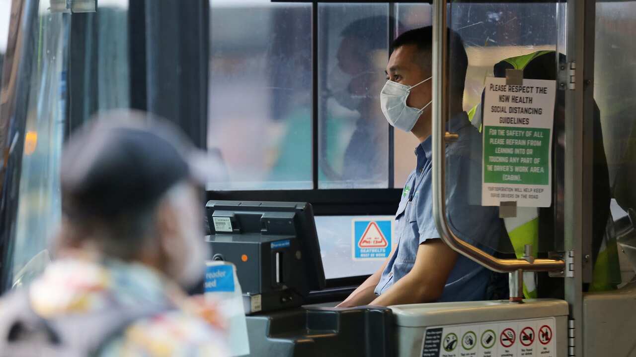 A bus driver wears a mask as a preventative measure against the coronavirus disease (COVID-19) at Railway Square bus station in Sydney, Wednesday, April 1, 2020. 