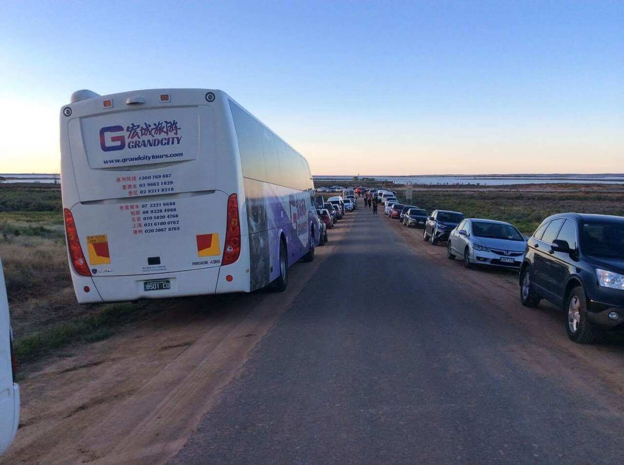 Bus and carloads of tourists parked by Lake Tyrrell astonished locals in the once sleepy 'ghost town'. 