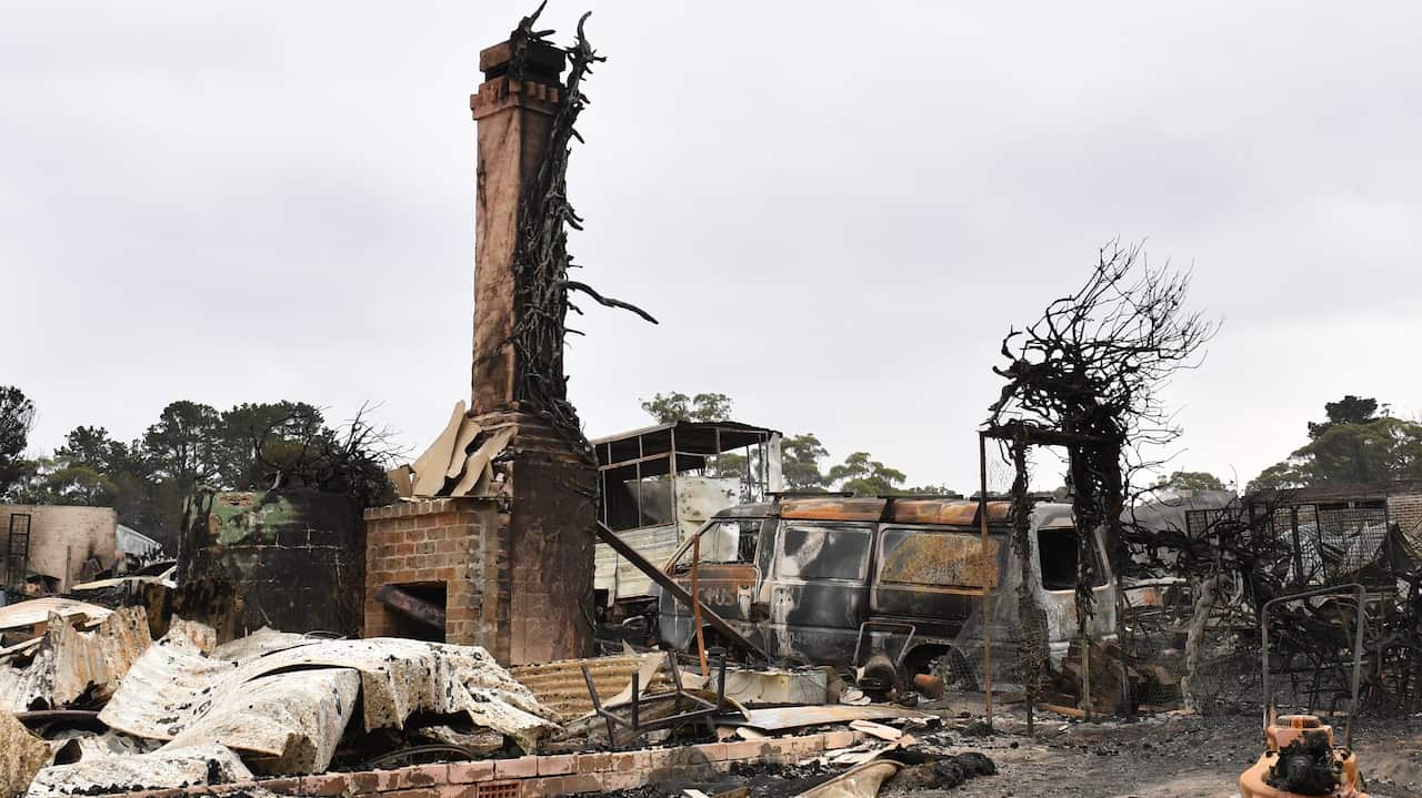 The burnt out remains of a house is seen from a bushfire in the Southern Highlands town of Wingello, 160km south west of Sydney, Monday, January 6, 2020. (AAP Image/Mick Tsikas) NO ARCHIVING
