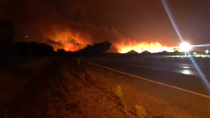 Fire started in Redmond just outside of Albany, now being fanned by strong winds.