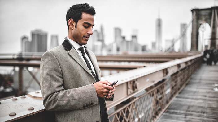 A Young businessman of Indian origin living in abroad. 