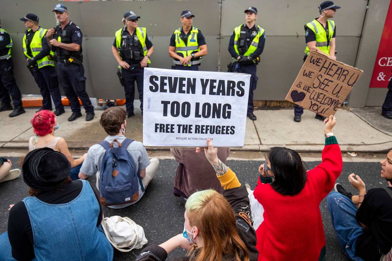 Protesters supporting the asylum seekers detained at Brisbane's Kangaroo Point Central Hotel, Sunday, June 28, 2020. 