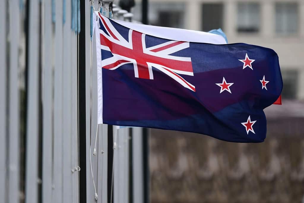 The New Zealand flag flutters outside Parliament buildings in Wellington
