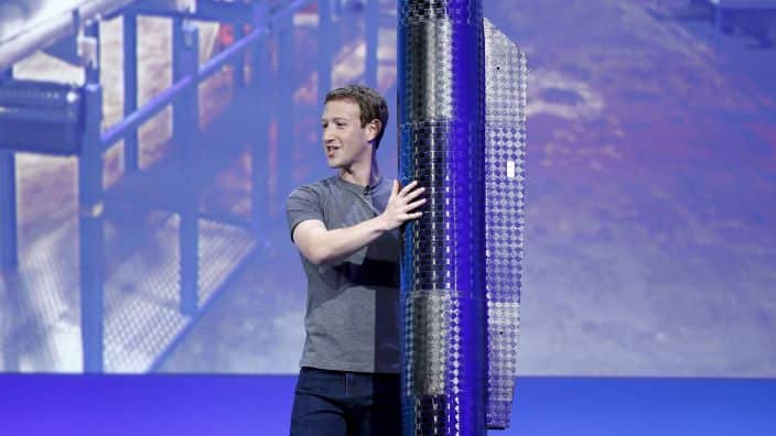 Facebook CEO Mark Zuckerberg holds a propeller pod of the solar-powered Aquila drone on stage