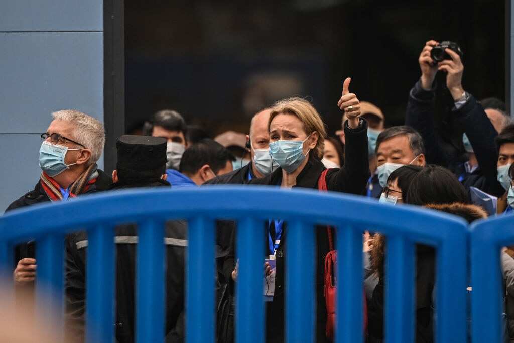 Thea Fisher (C) and other members of the World Health Organization (WHO) team, investigating the origins of the COVID-19 coronavirus, visit the closed Huanan Seafood wholesale market in Wuhan.