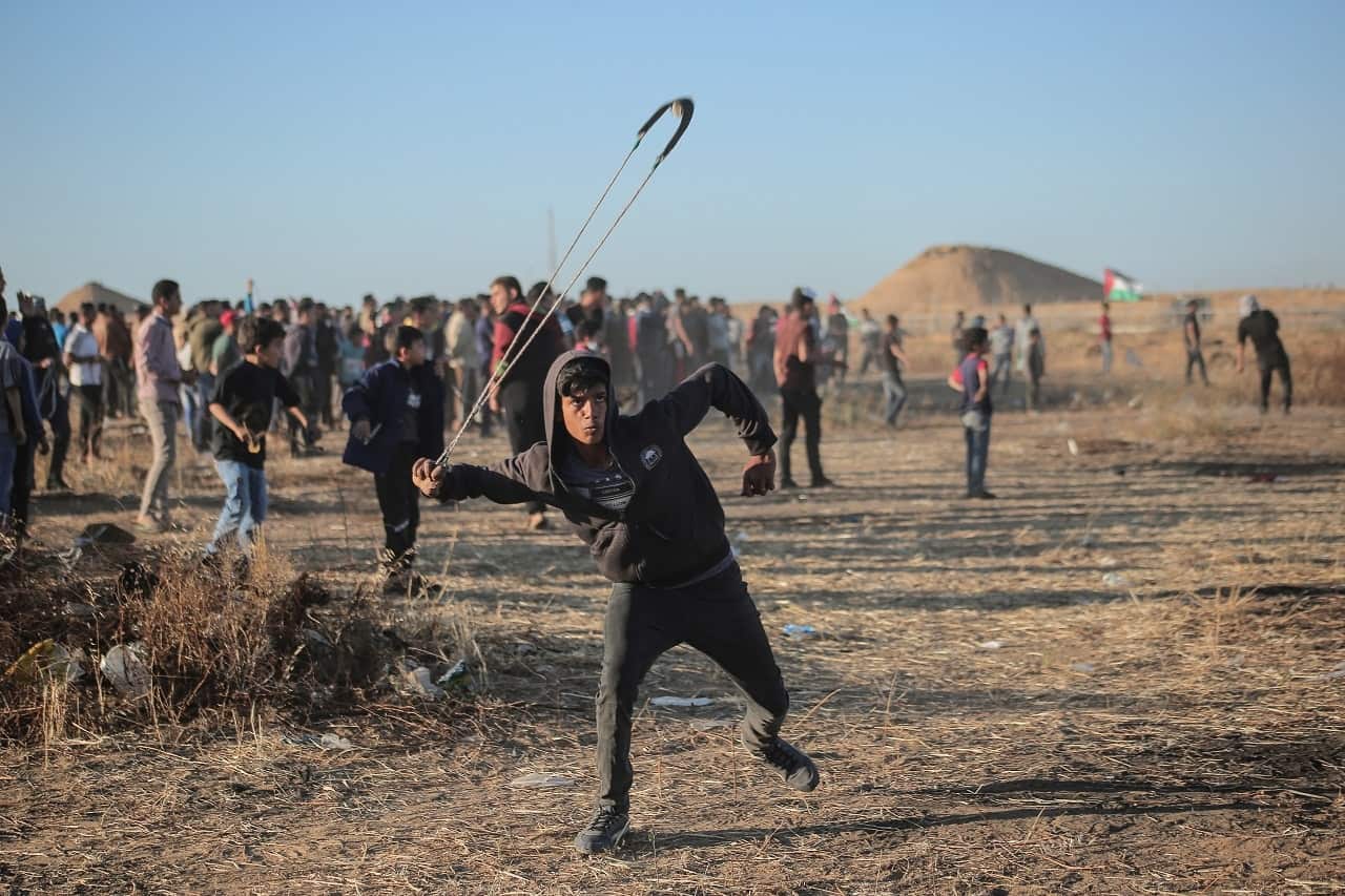 Palestinian protesters clash with Israeli troops in May.