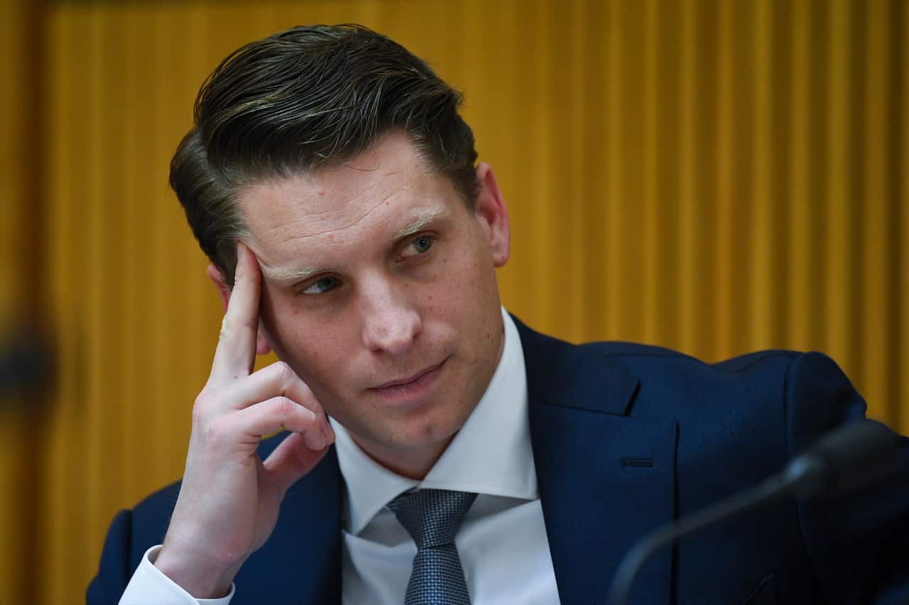 Committee chair Andrew Hastie reacts during a hearing of parliamentary intelligence and security committee at Parliament House in Canberra, Wednesday, August 14, 2019. (AAP Image/Lukas Coch) NO ARCHIVING