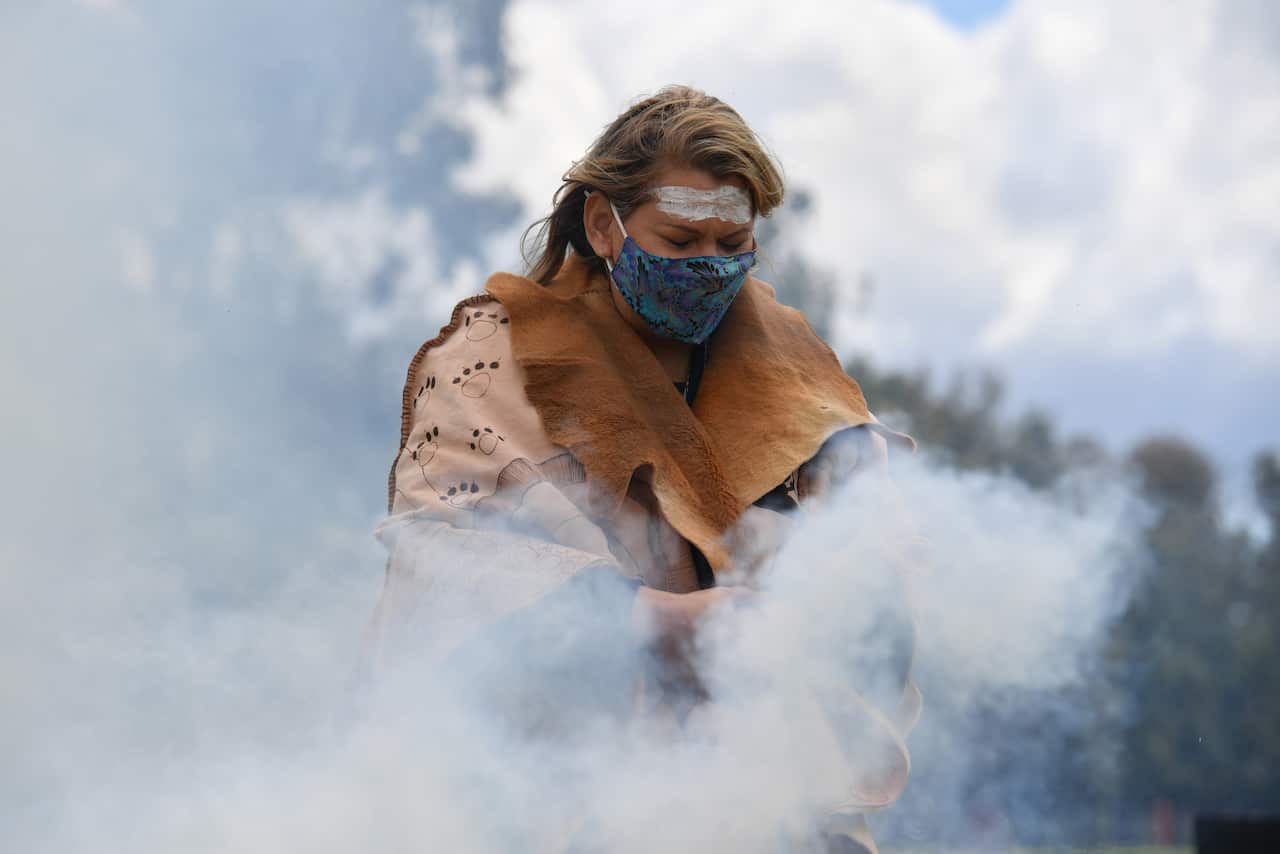 Greens Senator Dorinda Cox at an indigenous smoking ceremony at the Aboriginal Tent Embassy outside Old Parliament House in Canberra.