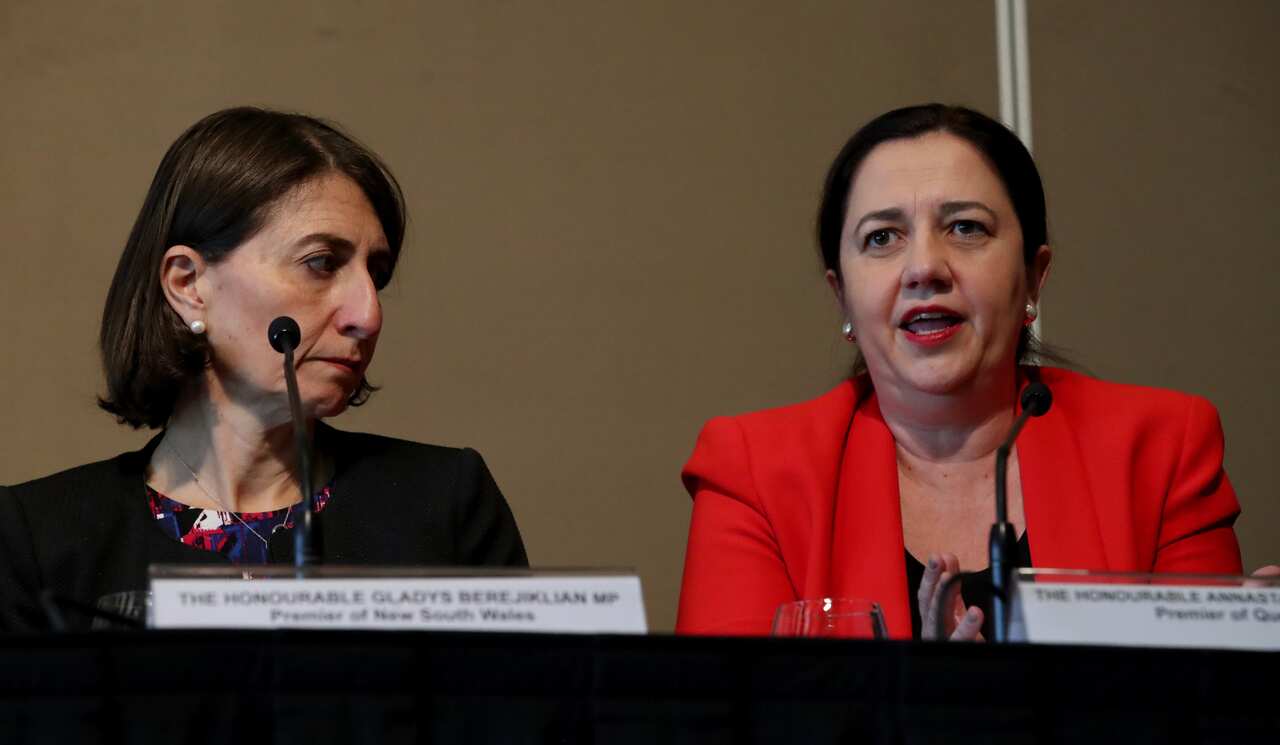 Premier of NSW Gladys Berejiklian and Premier of Queensland Annastacia Palaszczuk, speak with the media after the Council of Australian Governments (COAG) meeting in Adelaide, Wednesday, 12 December 2018. (AAP Image/Kelly Barnes) NO ARCHIVING