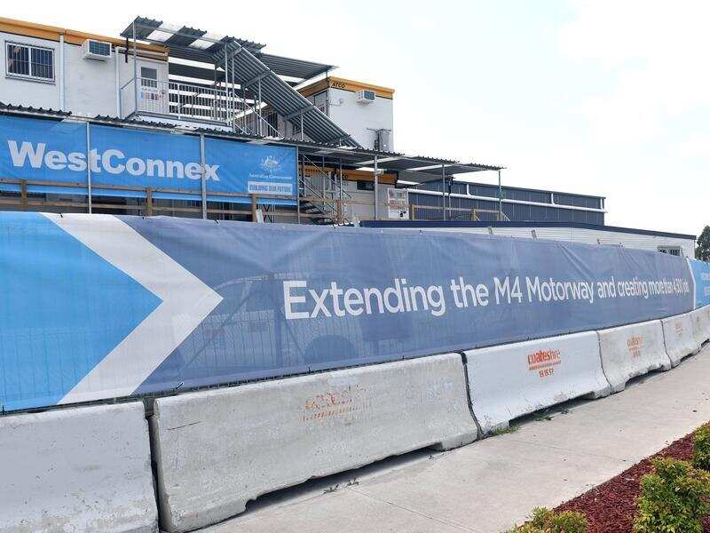 Banners line the construction site of the M4 extension