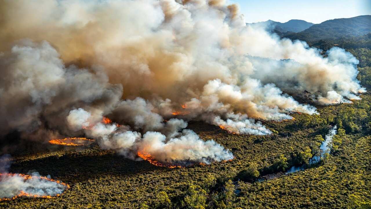 A large bushfire burning in Tasmania, Australia. Some 55,0000 hectares of wilderness and bushland across the state has been ravaged by scores of fires.