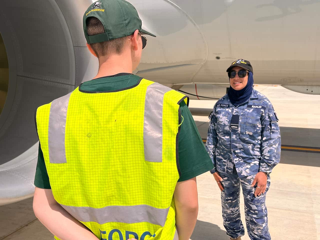 Flying Officer Ayah Khalid (right) says it was her dream to be in the military 