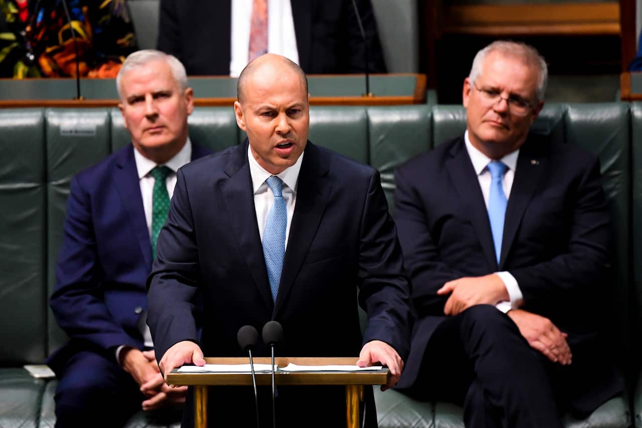 Australian Treasurer Josh Frydenberg hands down his third Federal Budget in the House of Representatives at Parliament House in Canberra, 11 May, 2021.