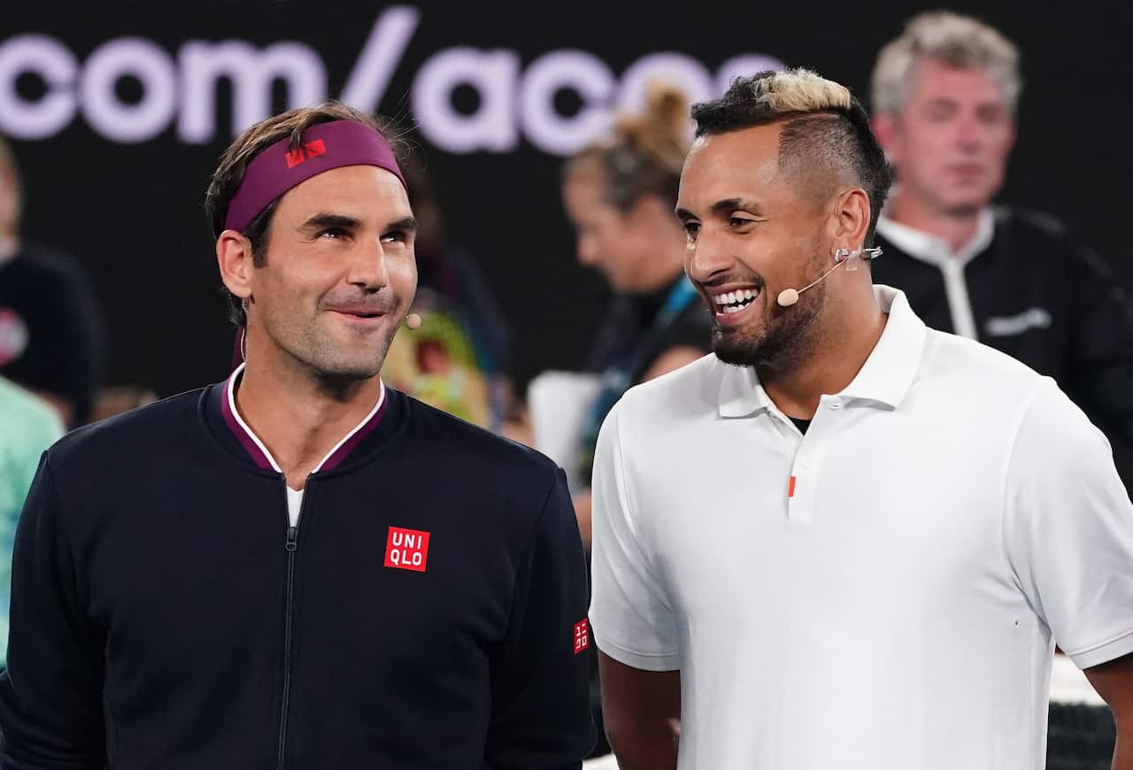 Roger Federer y Nick Kyrgios posan para una foto durante el ‘Rally For Relief’.