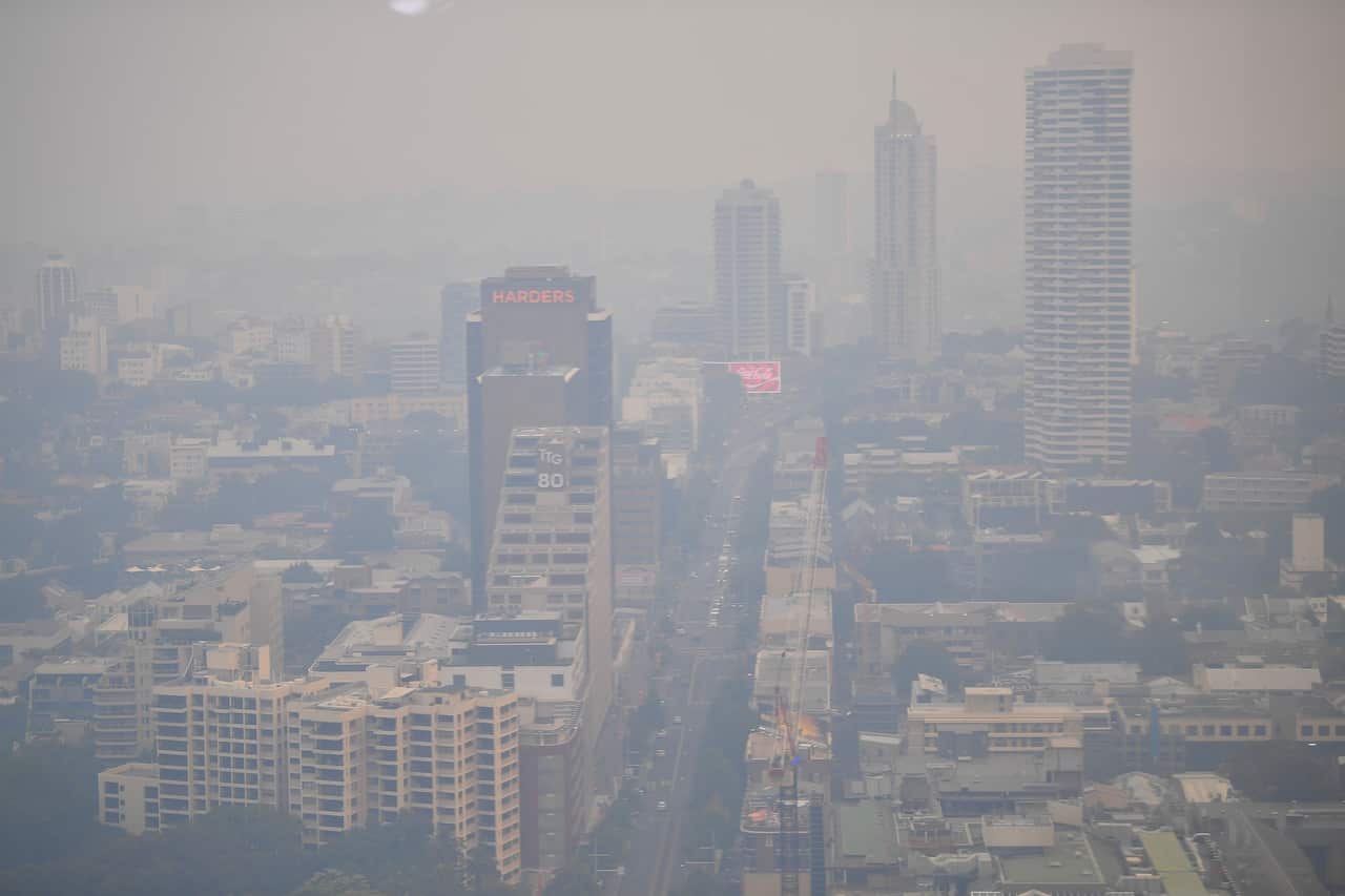 Kings Cross can be seen as smoke haze from bushfires in New South Wales blankets the CBD in Sydney, Monday, December 2, 2019. (AAP Image/Steven Saphore) NO ARCHIVING